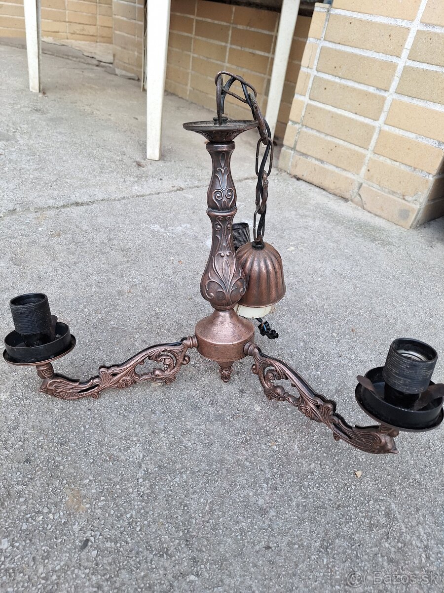 Starý medený luster