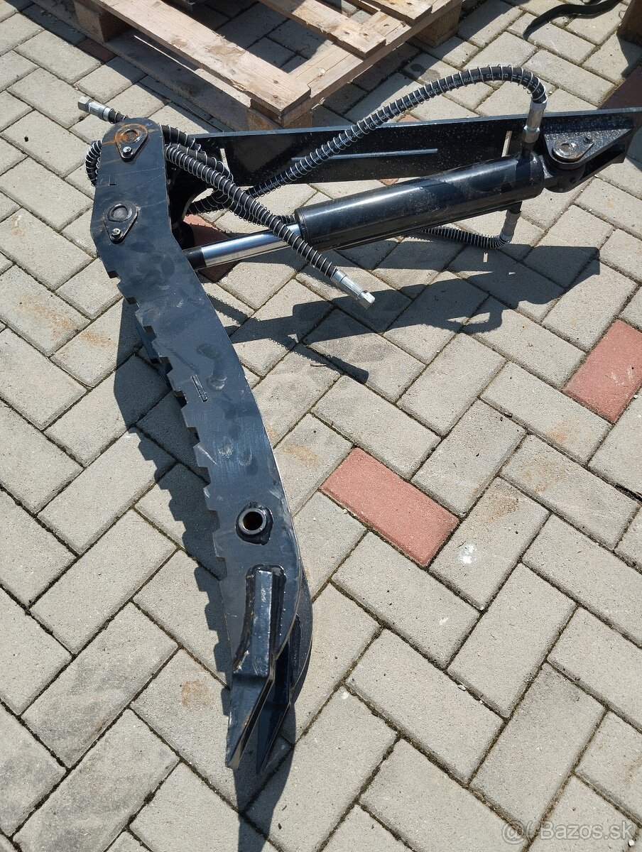 hydraulicky pridržiavaci palec