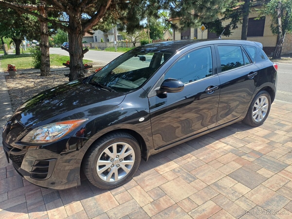 Mazda 3---1.6i-benzin--77Kw-105Ps-najazdené.-157300km