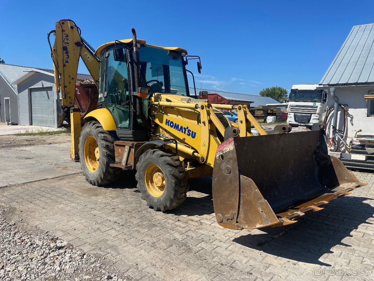 Traktorbager Komatsu spz