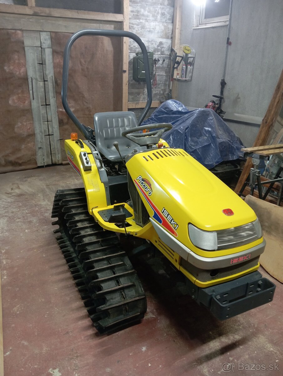 Predam pásový traktor.