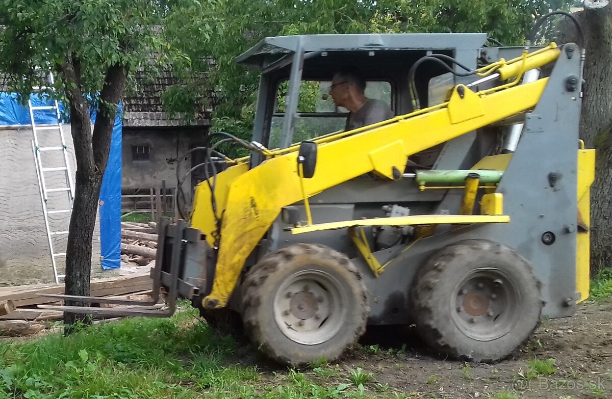 PREDÁM ŠMYKOVÝ NAKLADAČ UNC 060