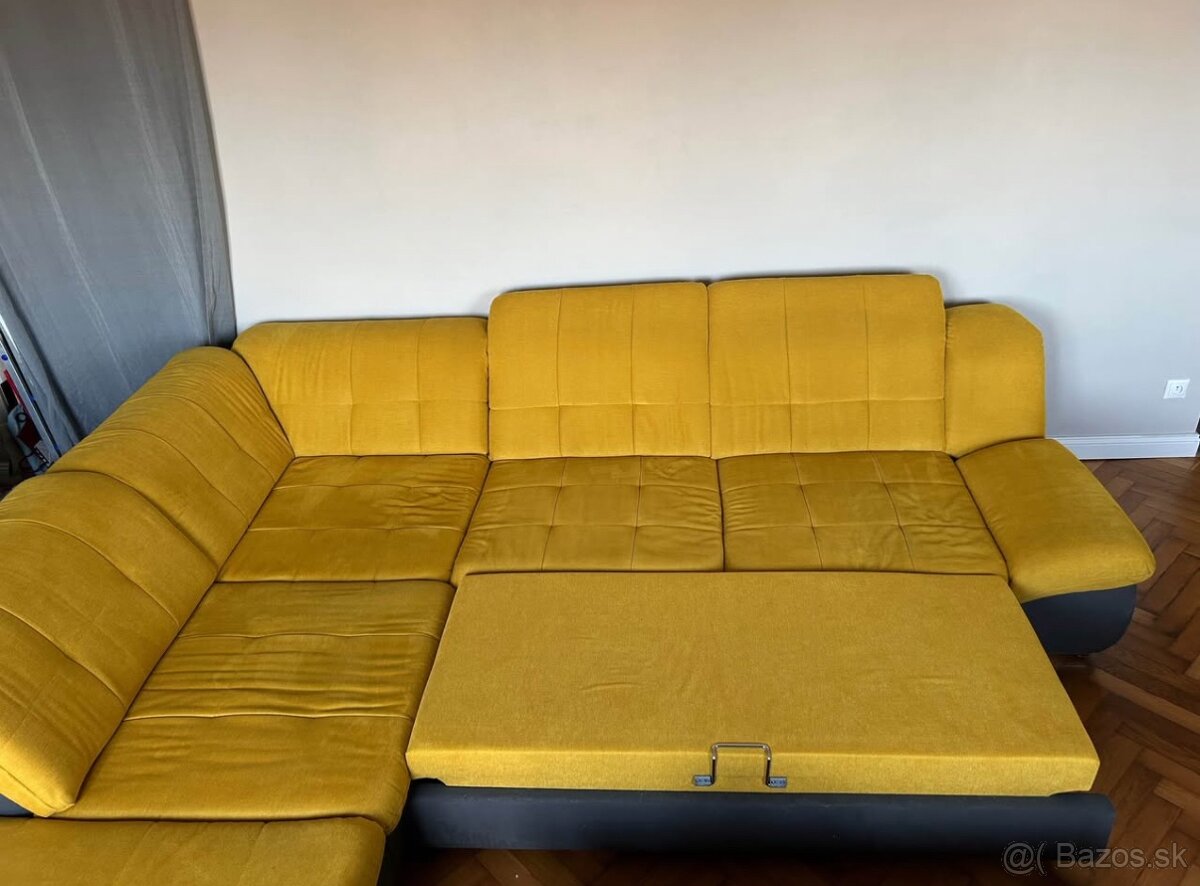 Rohova rozkladacia sedacka zlta seda