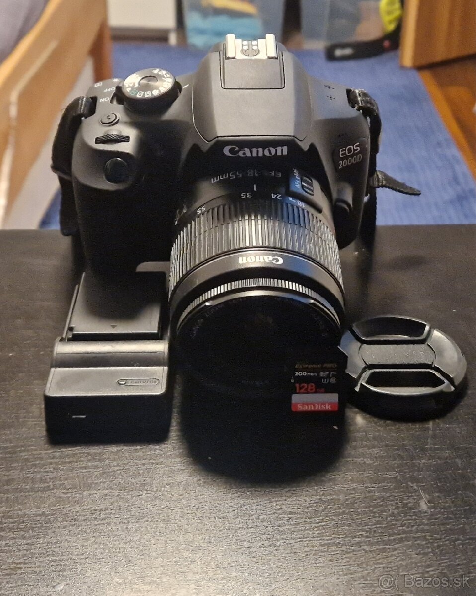 Predám fotoaparát Canon eos 2000d párkrát použitý.Obsah