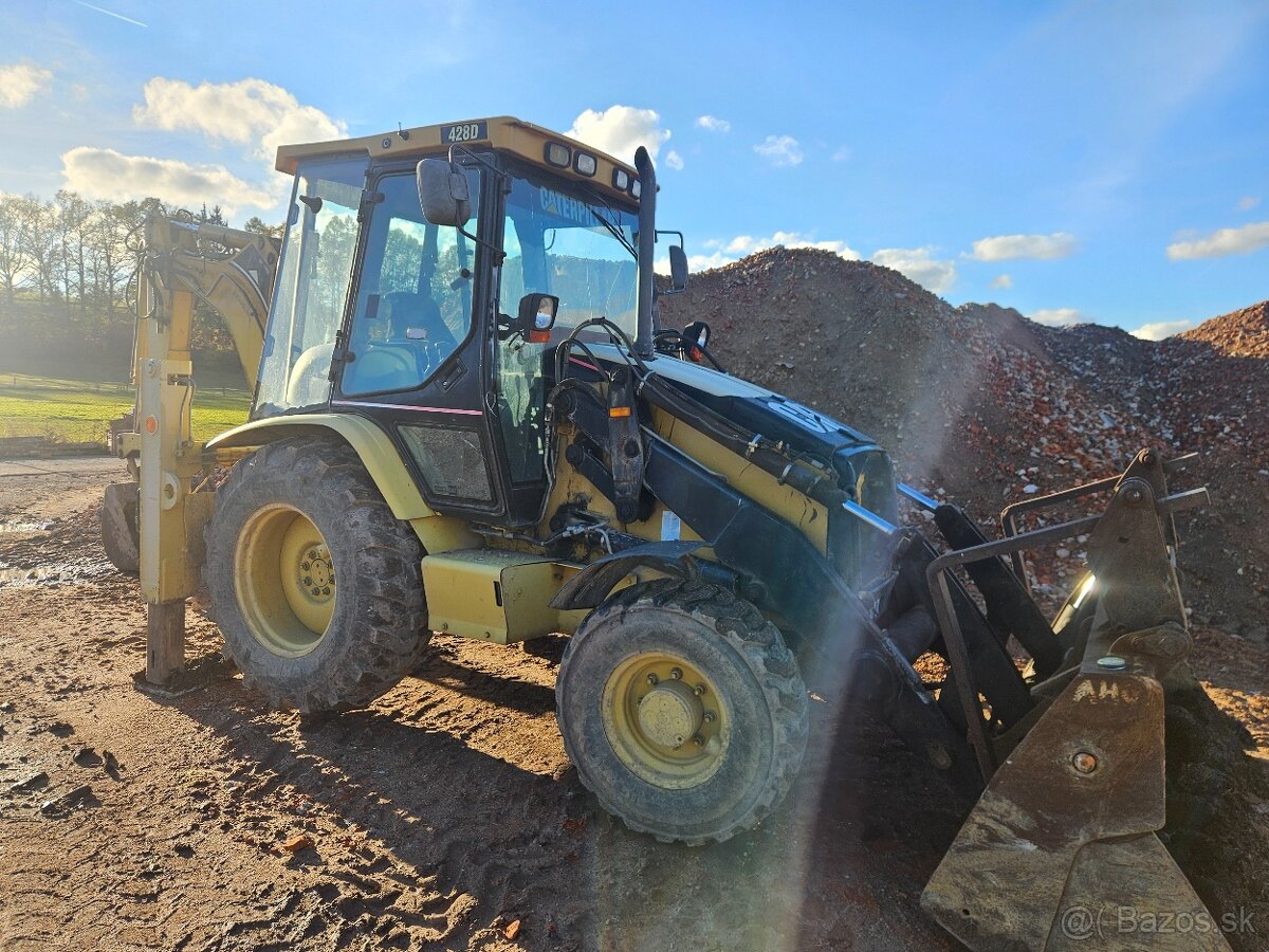 Traktorbagr Caterpillar 428D 4X4 + sbíjecí kladivo