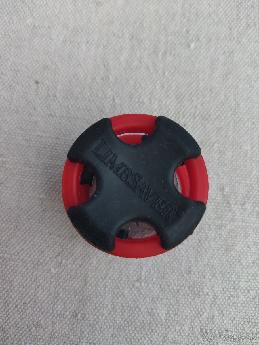 Tlmič na ramená luku