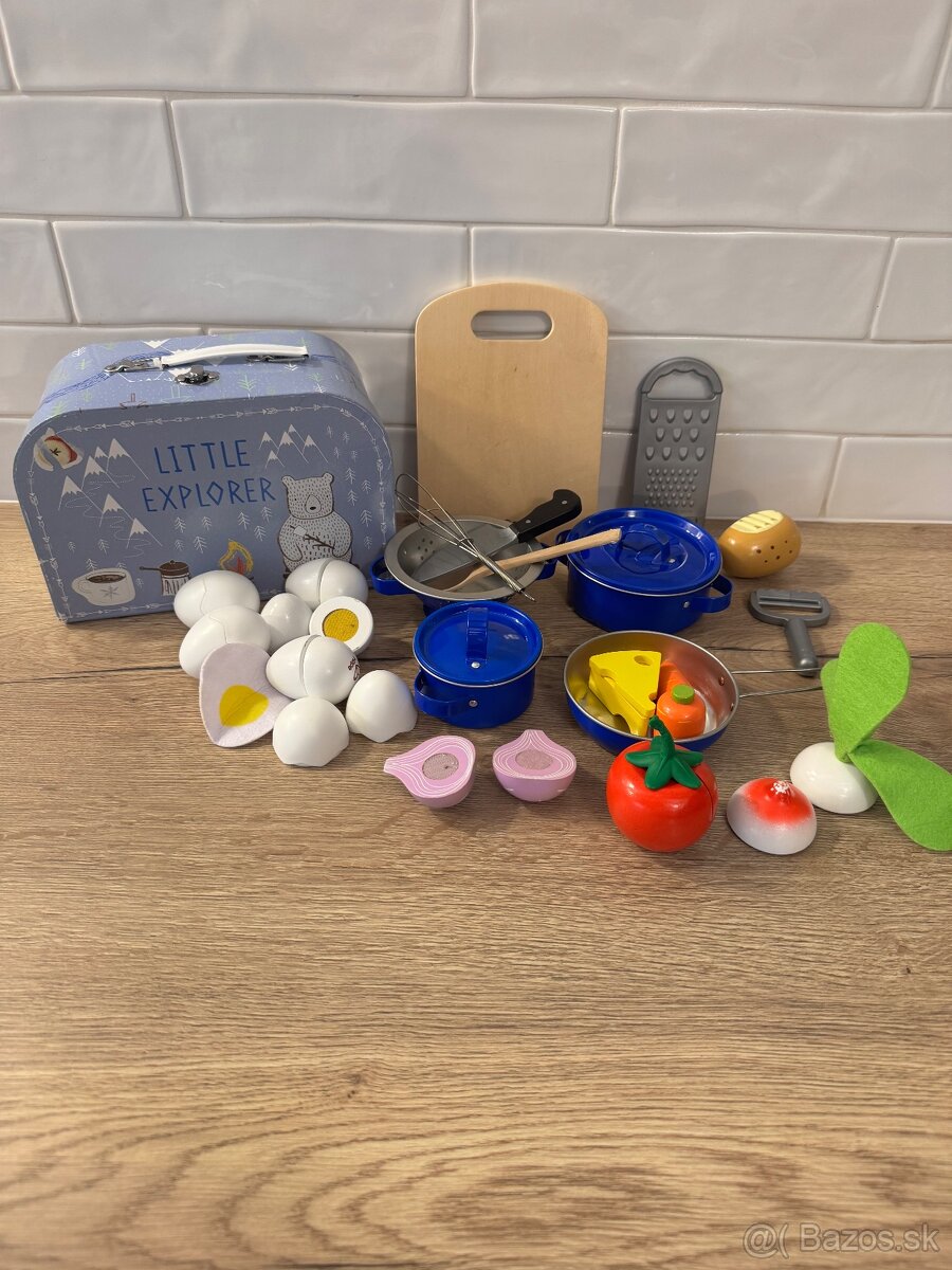 Kufrík s hráčmi a zeleninou