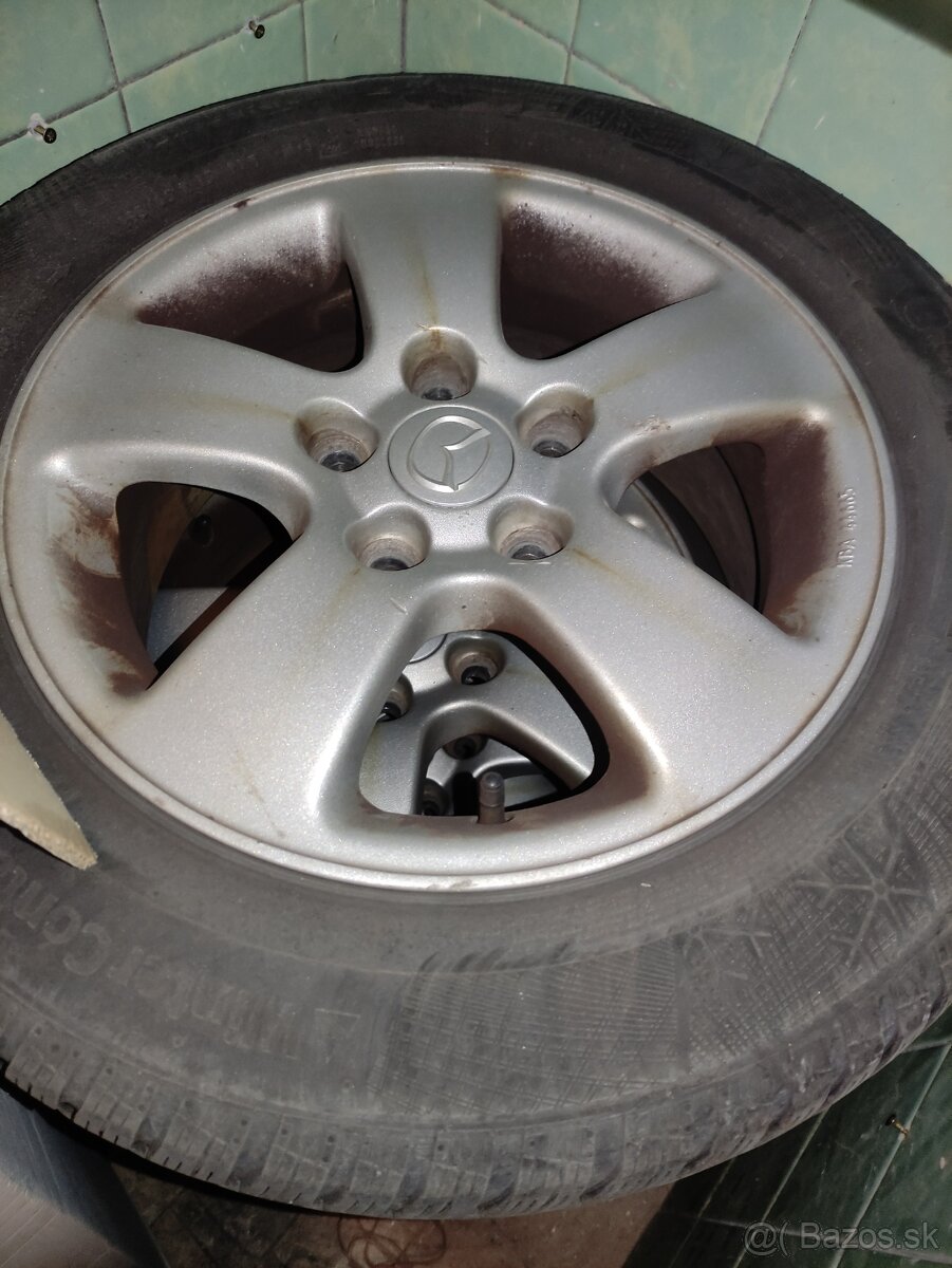 Originál hliníkové disky Mazda R15