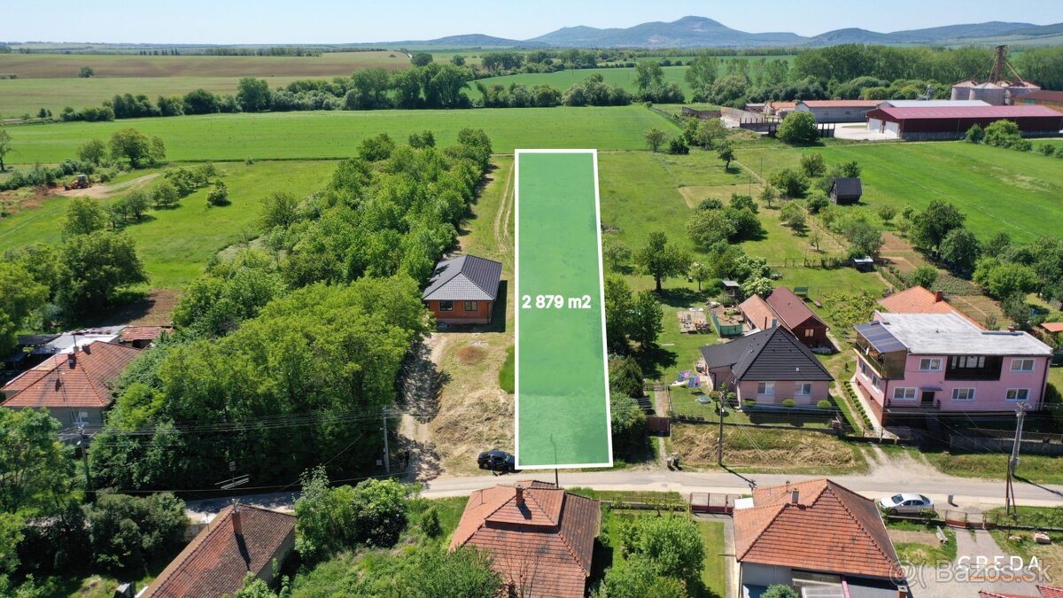 CREDA | predaj stavebný pozemok Sľažany okres ZM