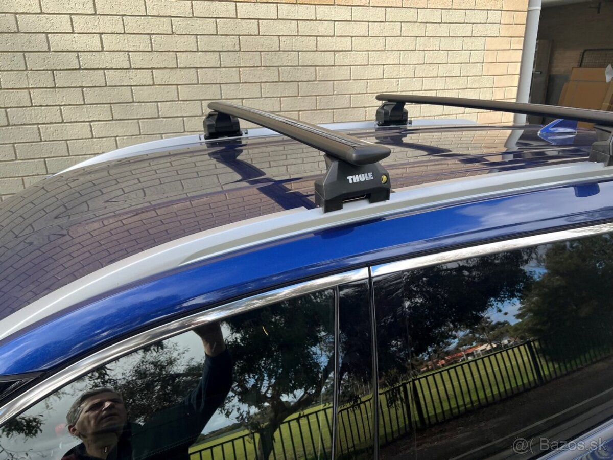 Predám strešný nosič Thule