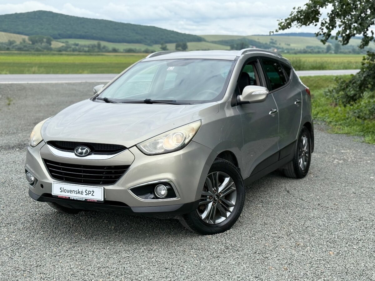 Hyundai ix35 Hnedy interier (polokoza)