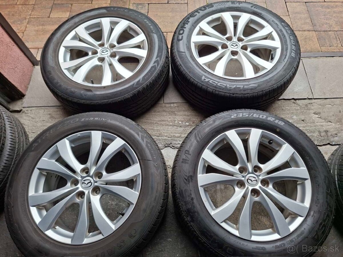 Orig.hliníkové disky Mazda R18, 5x114,3