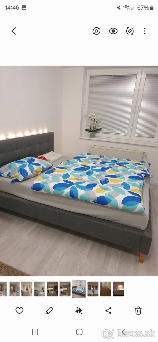 Čalúnená postel 160 cm s polohovatelnymi roštami