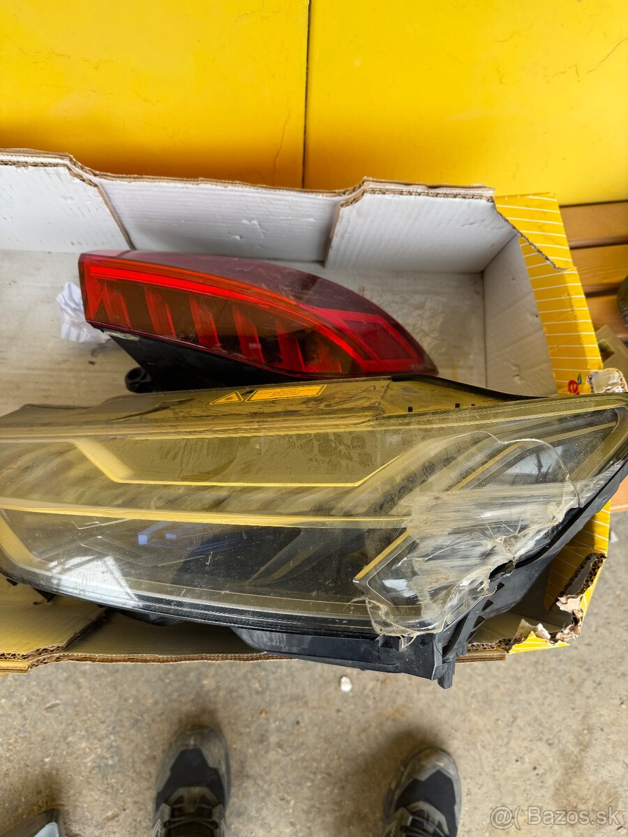 Poškodené svetlá Audi A7