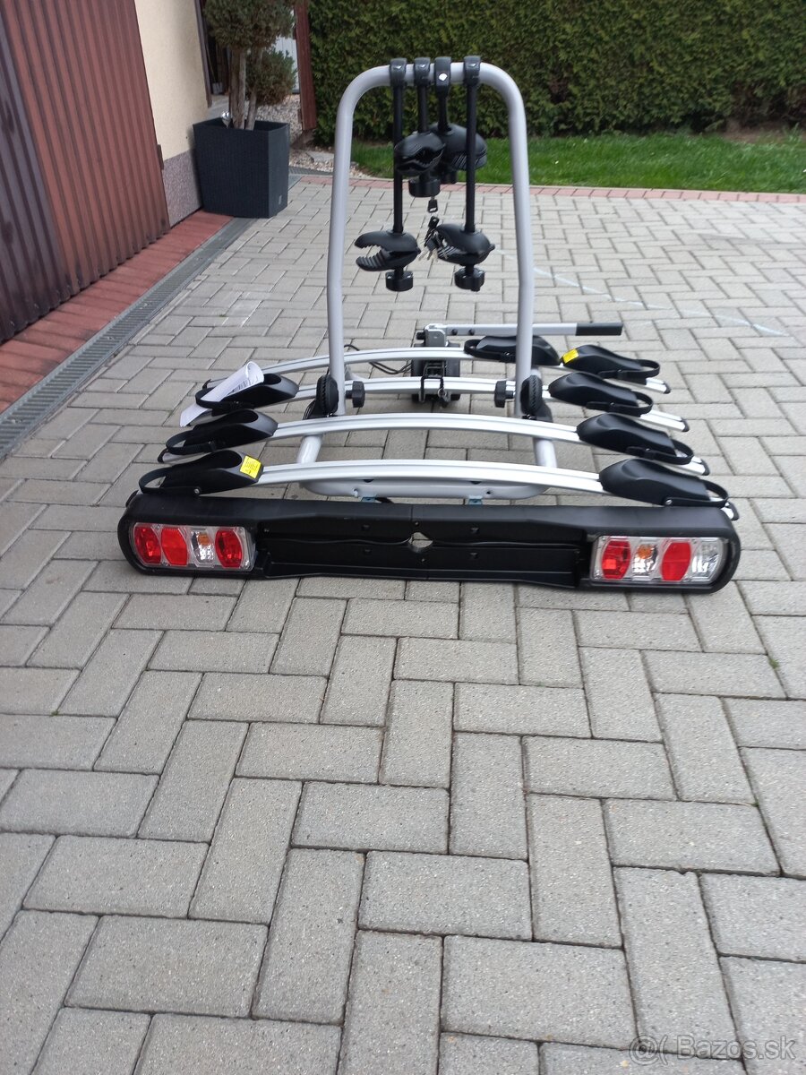 Predám nosič na ťažné zariadenie na 4 bicykle