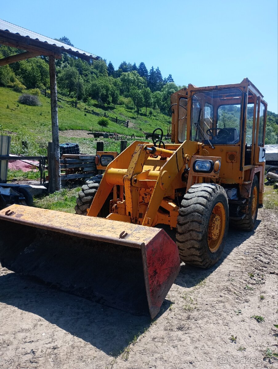 Bager ,traktor bager uzs 050