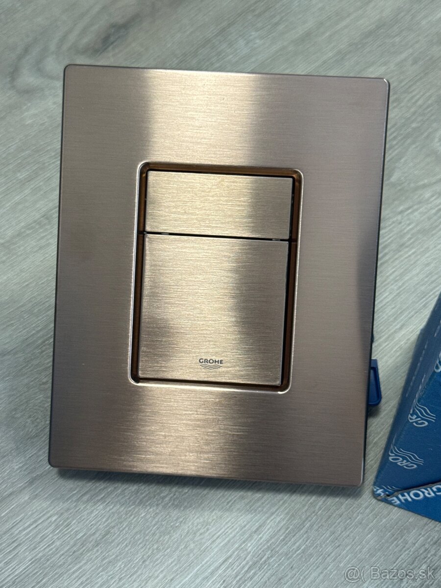 Splachovacie ovladacie tlacidlo brushed watm sunset grohe