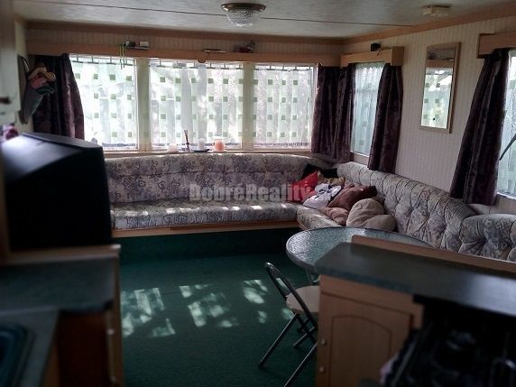 Parádny pozemok s mobilným domom na predaj