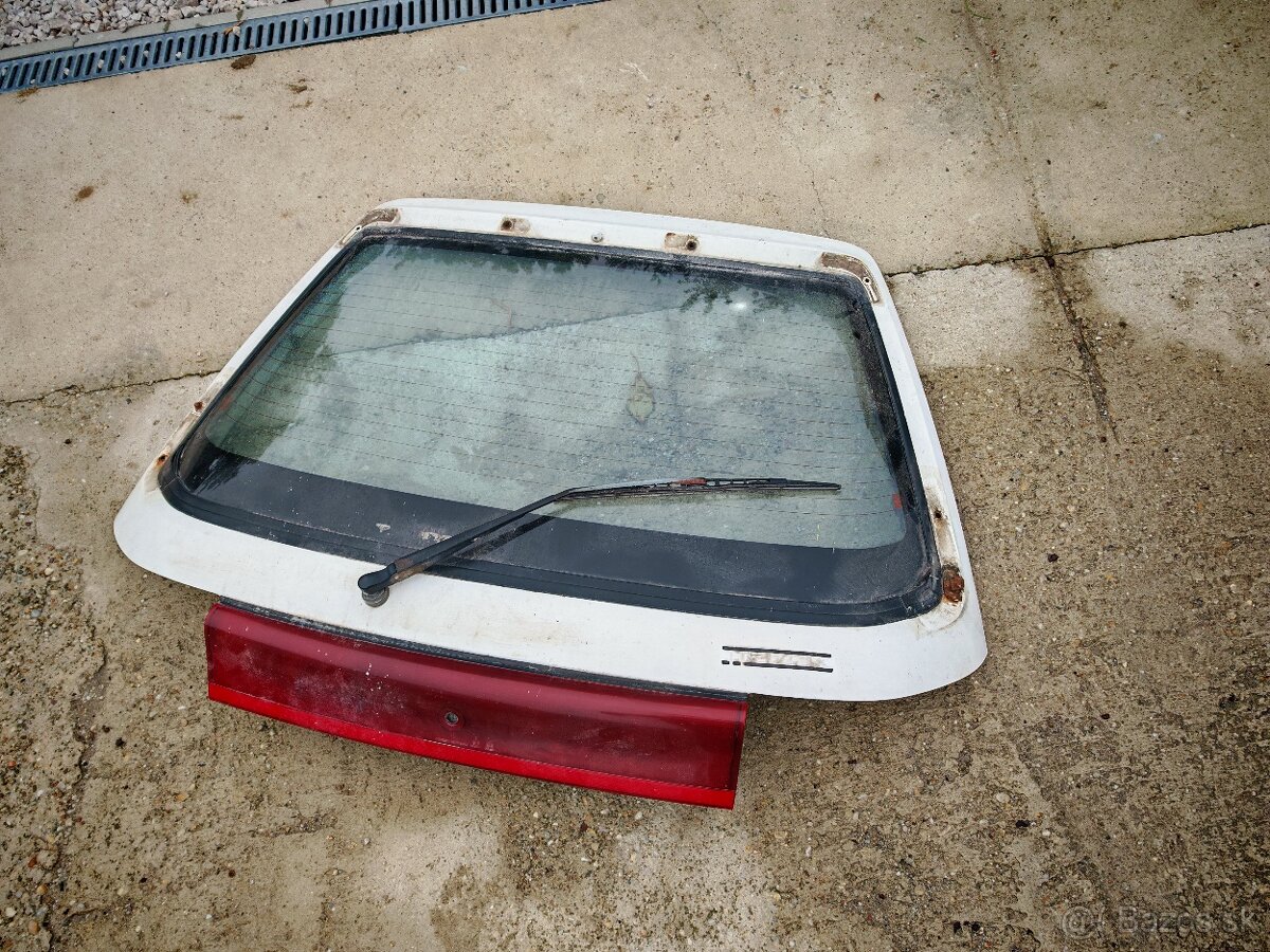Kufrove dvere mazda 323c BG