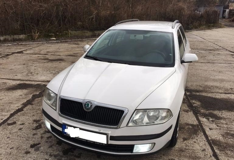 Rozpredam Skoda Octavia 2 1,9tdi 77kw farba biela 1026