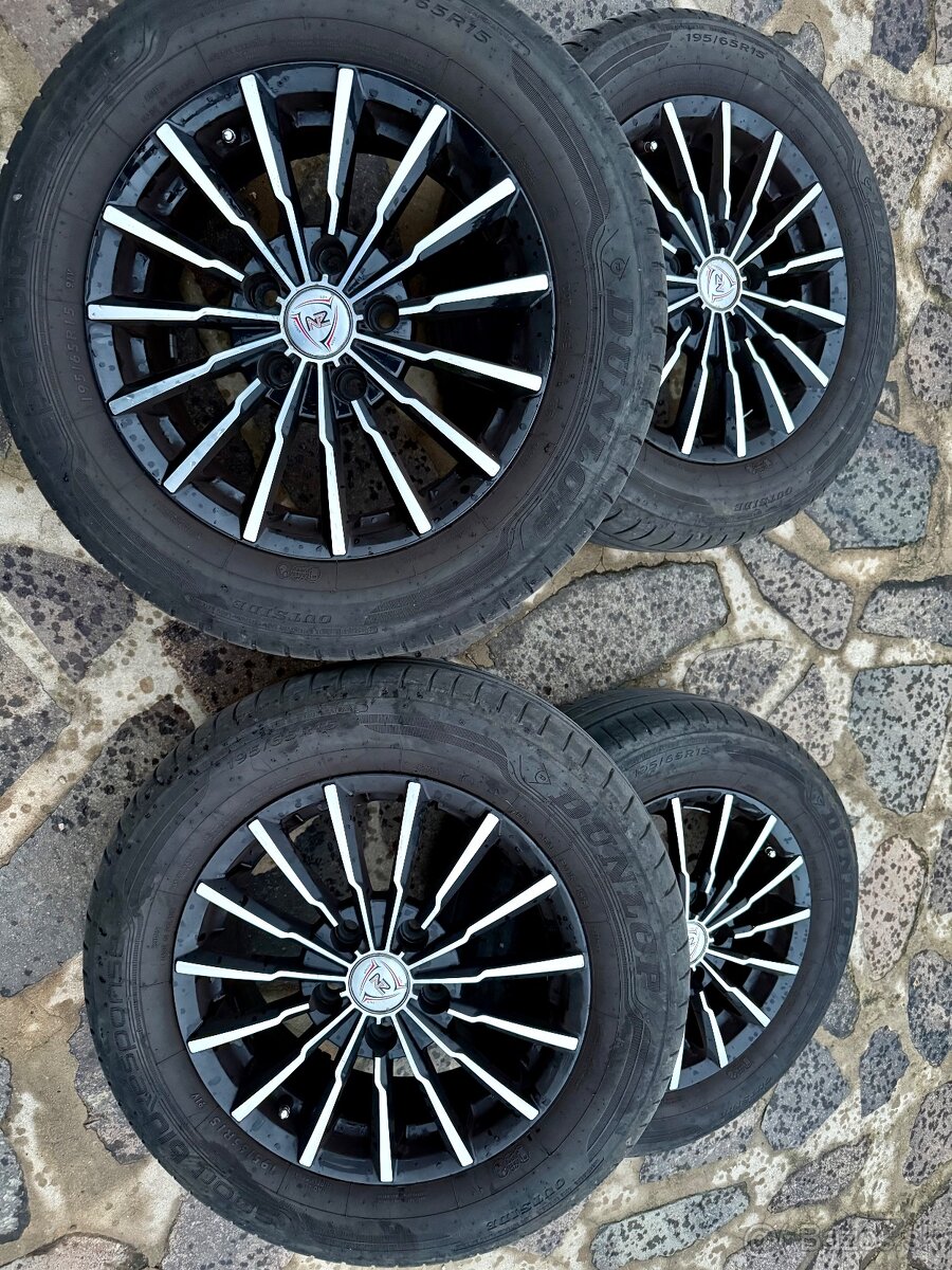 Hliníkové disky s letnými pneu dunlop