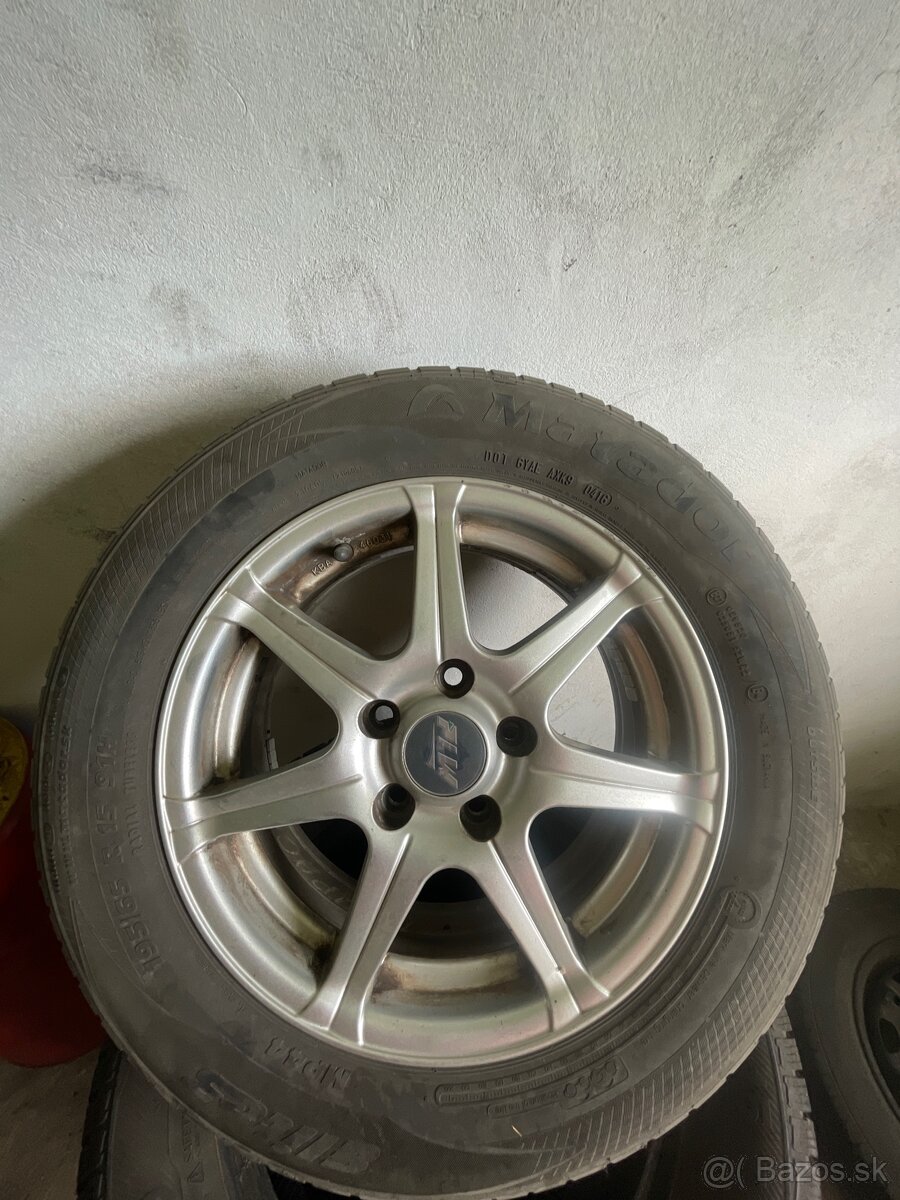 Disky +pneu Ford Focus - Fiesta - Fusion r15