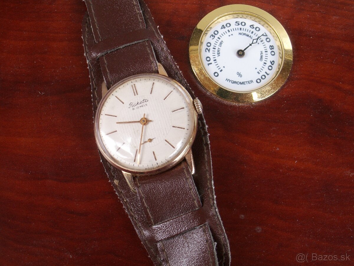 Hodinky Raketa pozlátené.