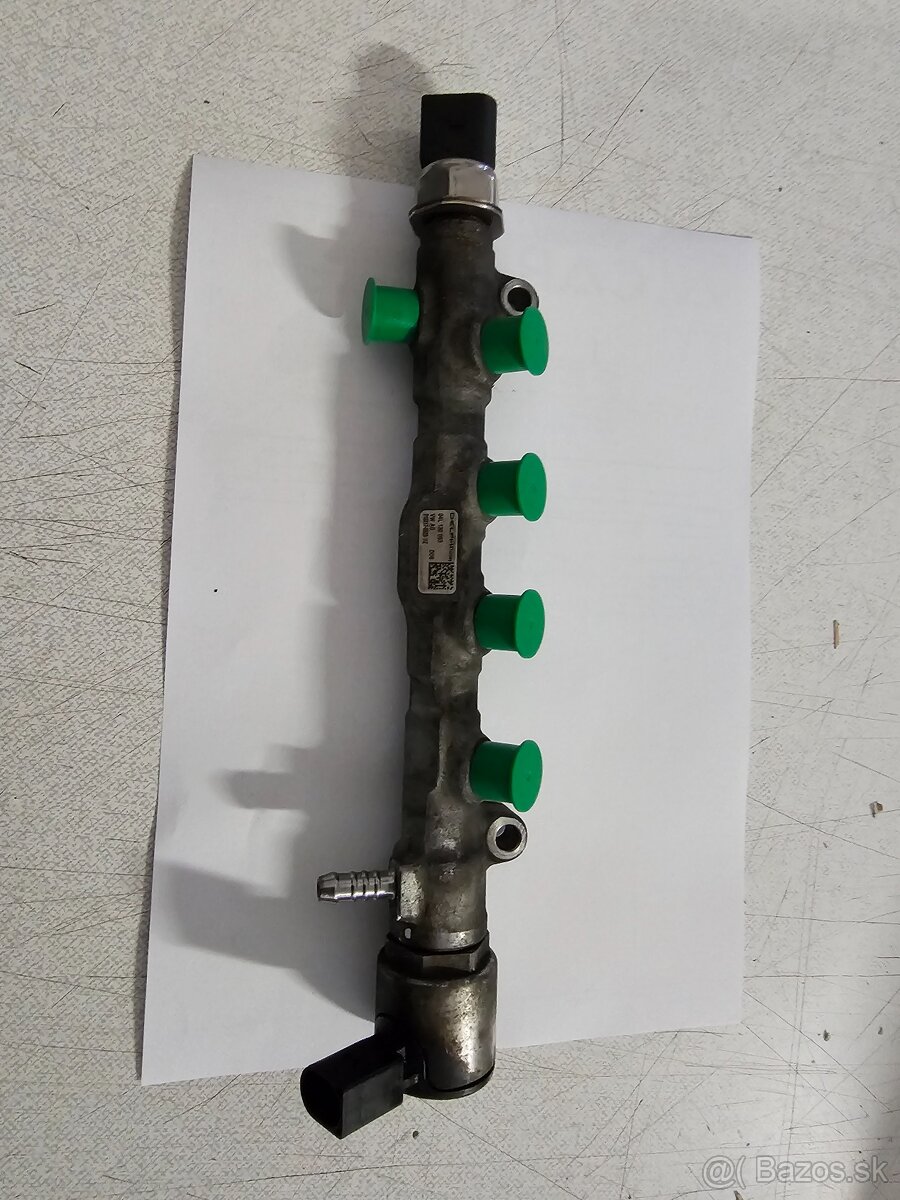 ROZDELOVAČ PALIVA 2.0 TDI 04L130093.