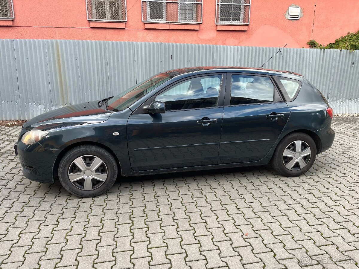 Mazda 3 1.6i. 77kW rok 2005