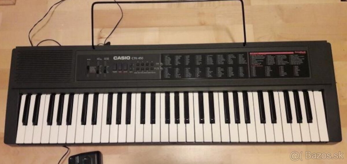 Keyboard Casio CTK - 450 s dřevěným kufrem