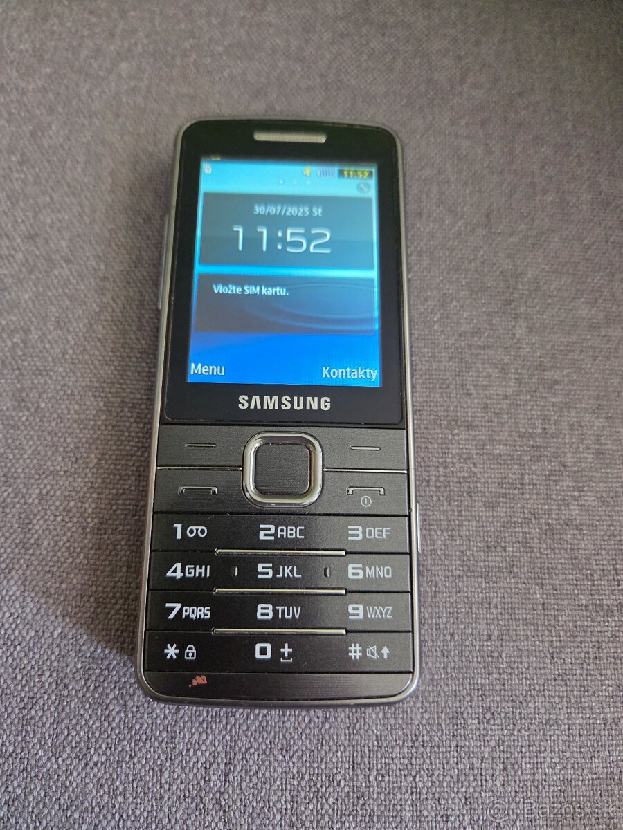 Samsung 5611 voľný v peknom stave plne funkčný plus nabíjačk