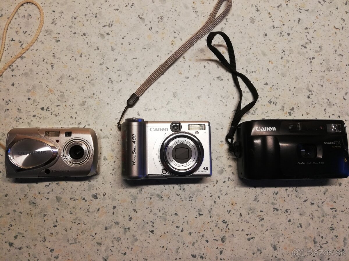 fotoaparáty Canon a Olympus