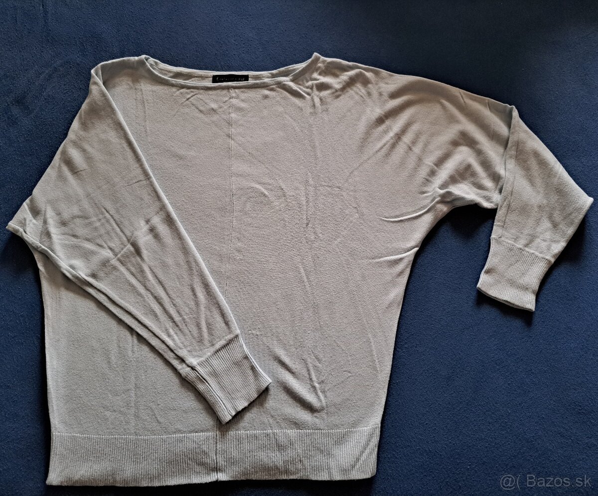Svetlomodrý pulóver M/L 1,50e