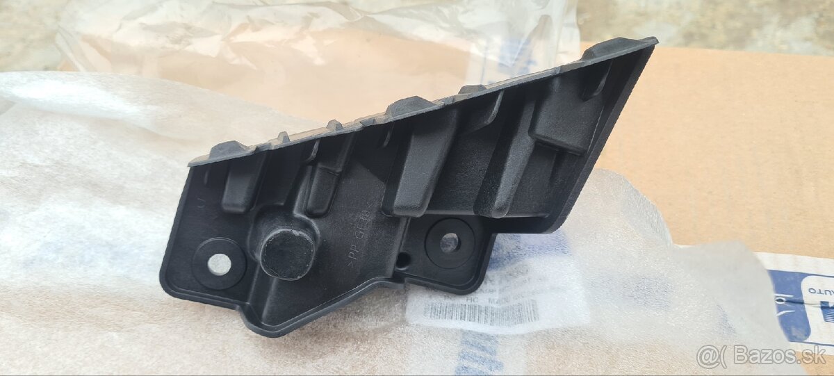 Držiak originál pravého svetla Hyundai Tucson nový P