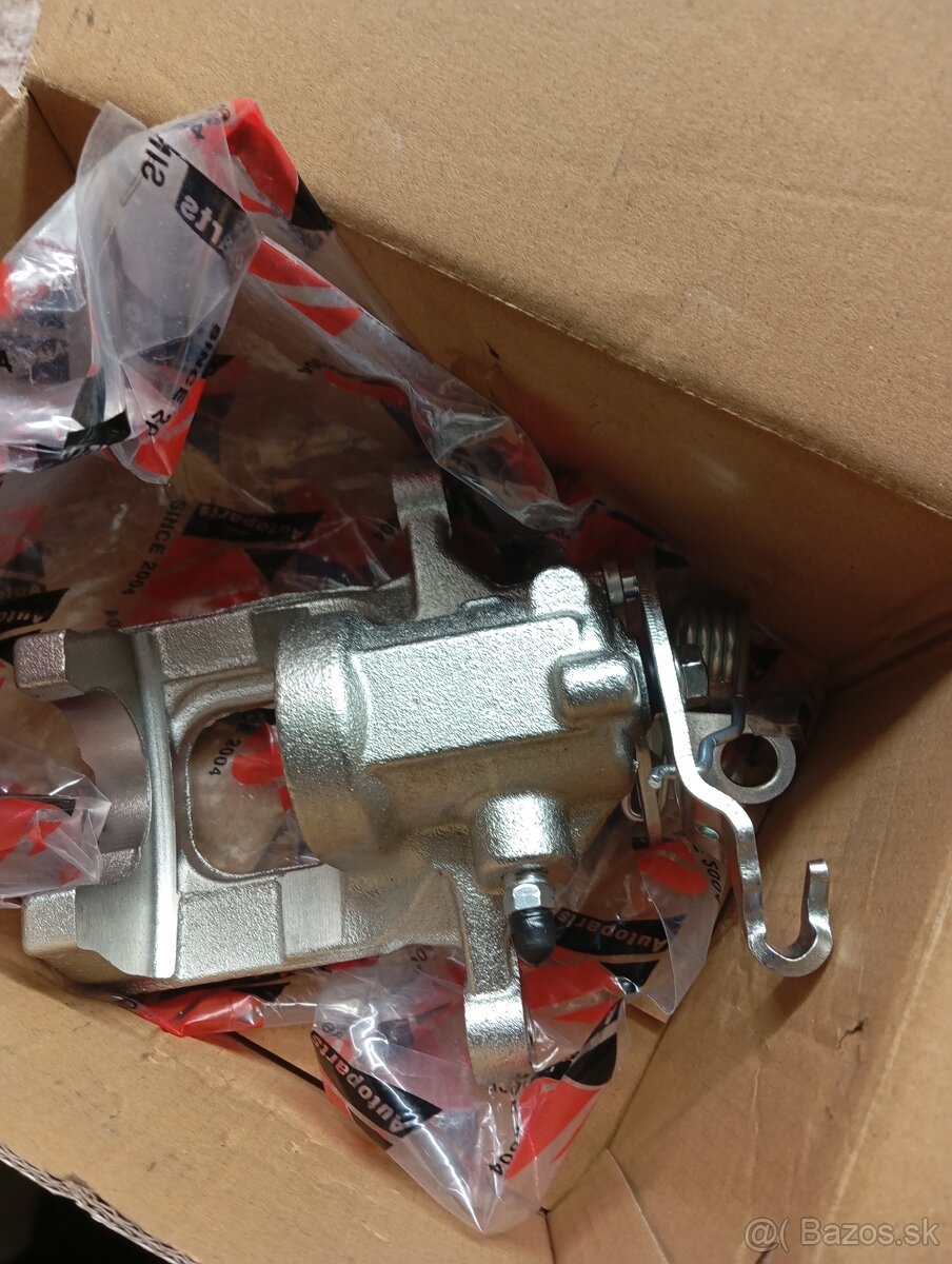 Predám nový zadný brzdový strmeň Škoda/Golf,viď fotto