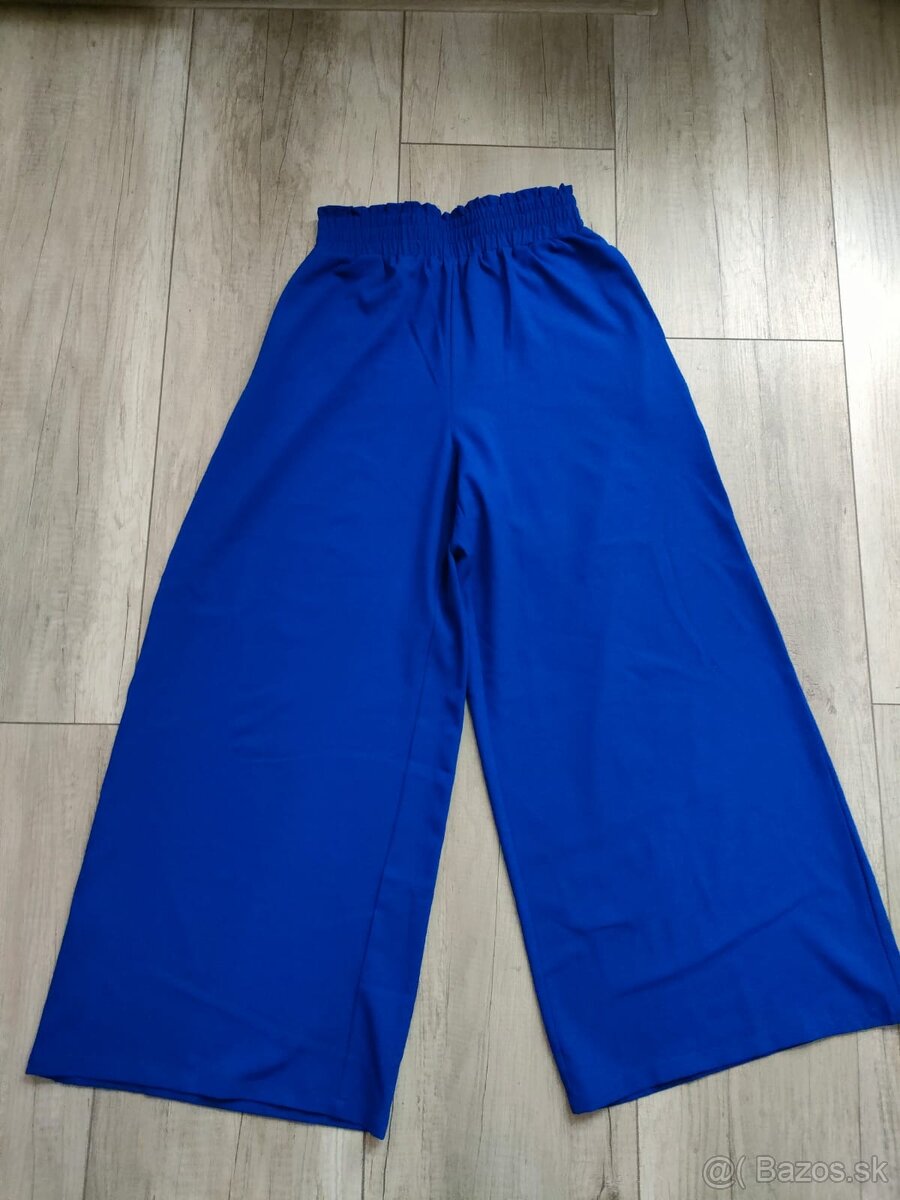 Modré nohavice 40/42