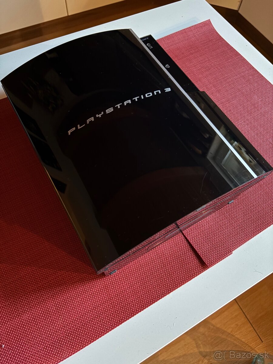 PlayStation 3 + 2 ovladače + hra Rayman