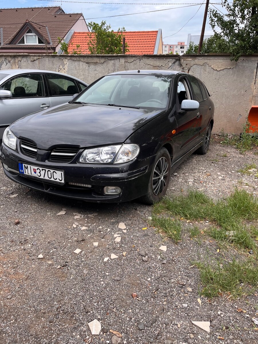 predam Nissan Almera