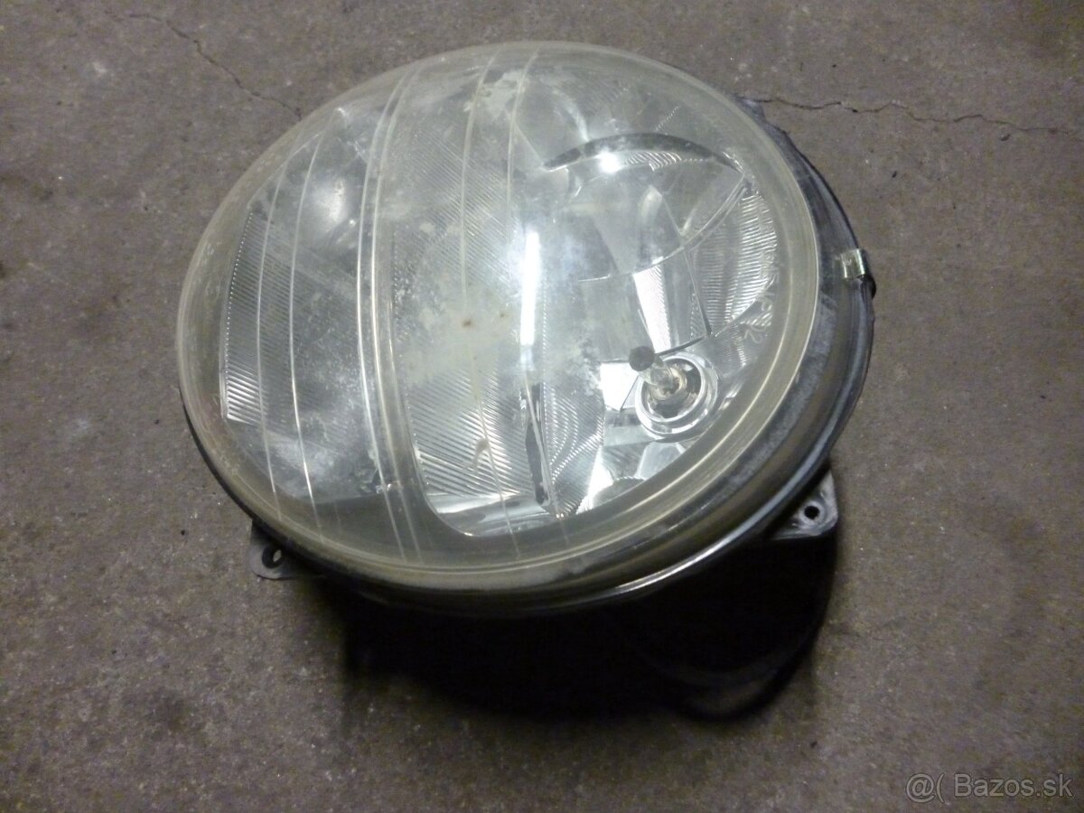 Aprilia Scarabeo 500 GT ABS. Přední světlo. od 2003