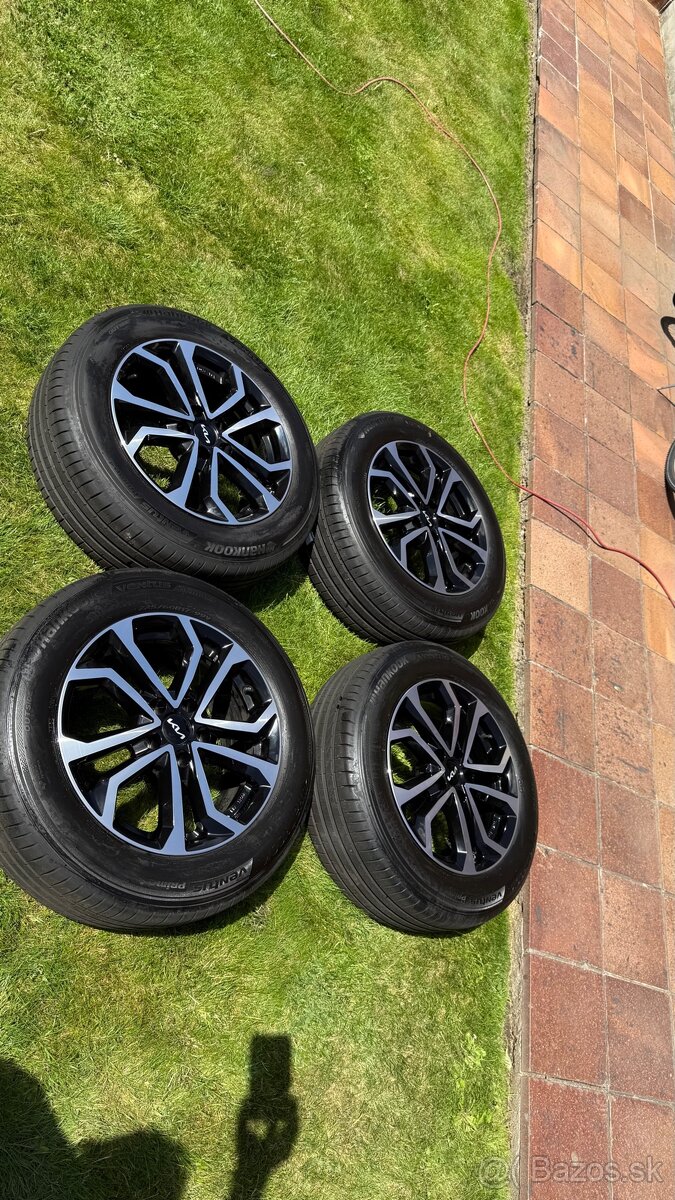 ALU disky Kia Sportage, s pneu zn. Hankook