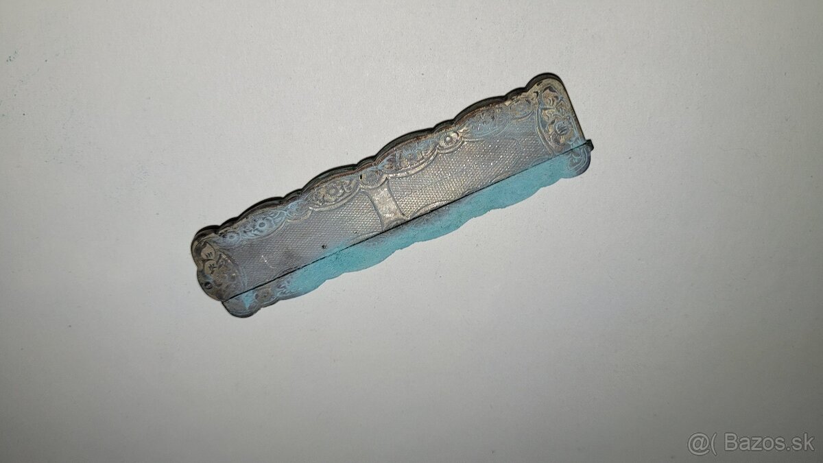 Starozitny skladaci strieborny hreben