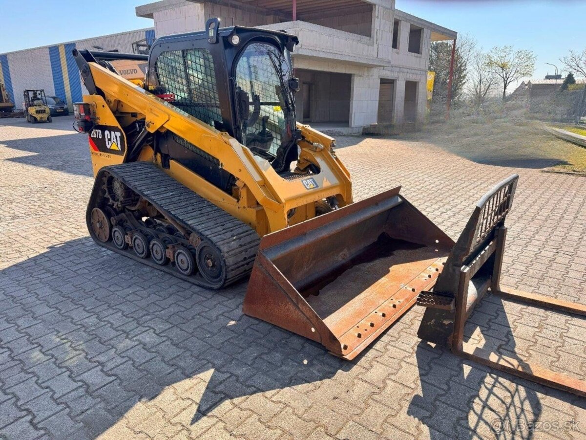 Nakladač Caterpillar 287D pásák