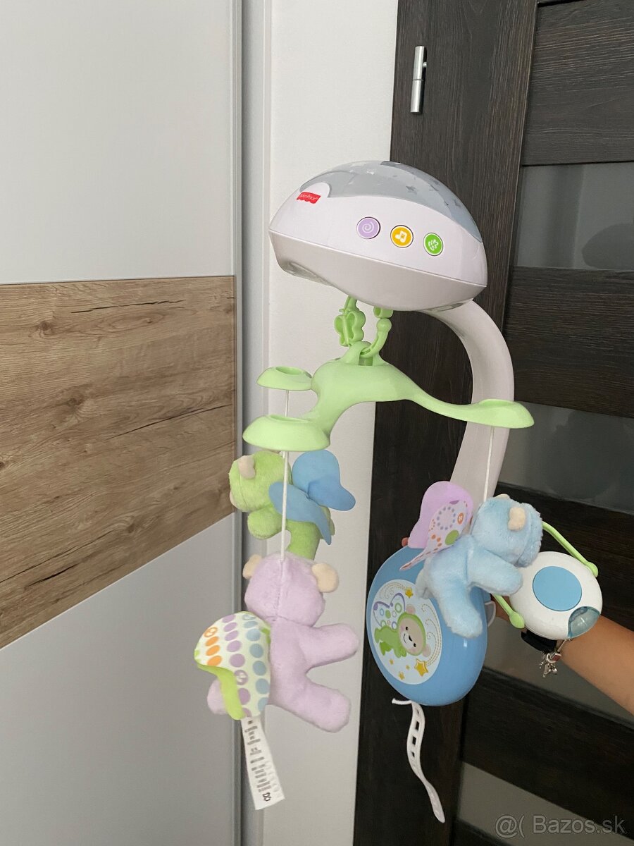 Fisher price kolotoc na postielku s dialkovym ovladacom