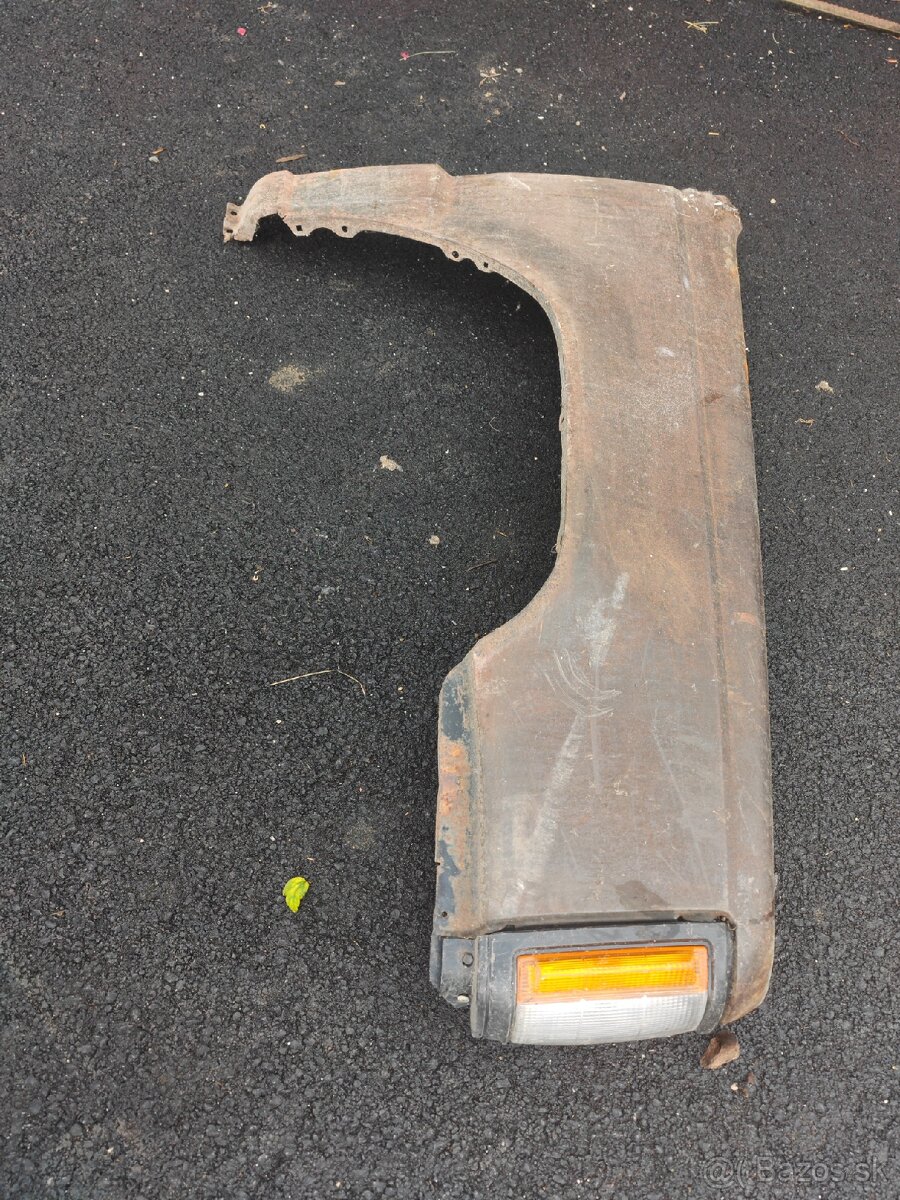 Predné blatníky Mitsubishi L200 1995