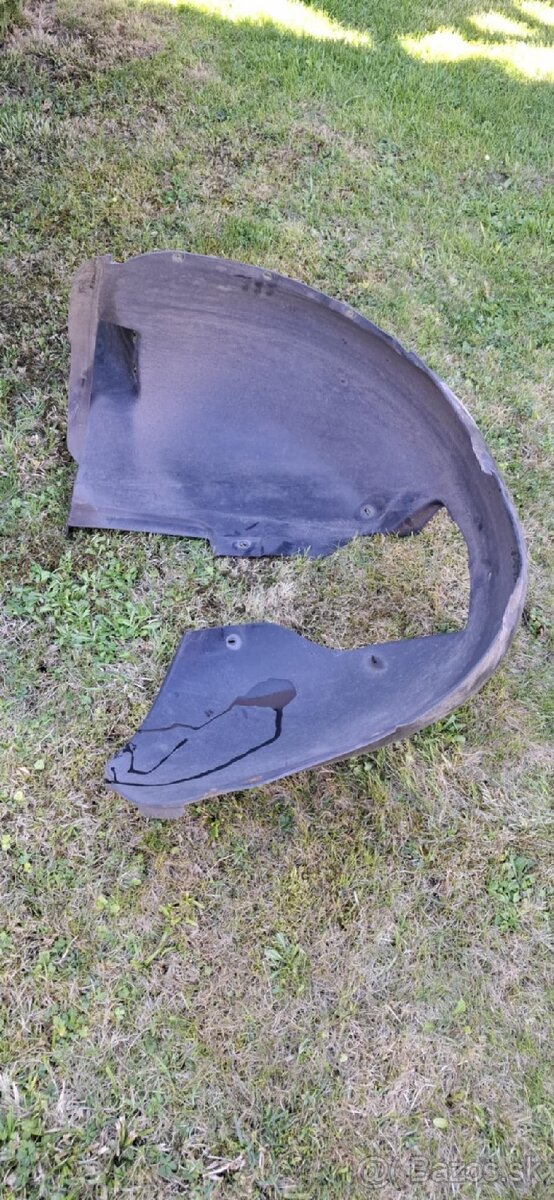 Ľavý predný podblatník Škoda Superb 2 2008-2015