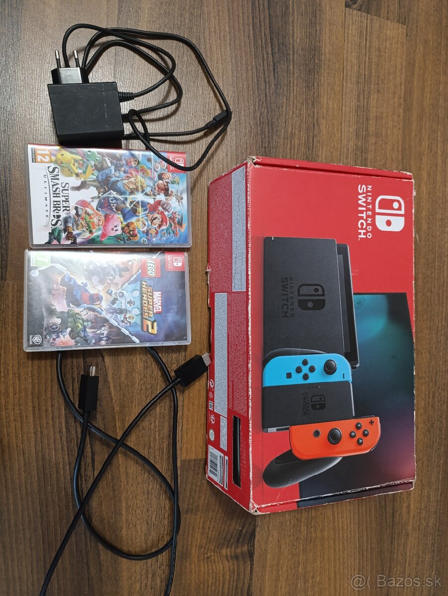 Použitý Nintendo Switch príslušenstvo + 2 hry