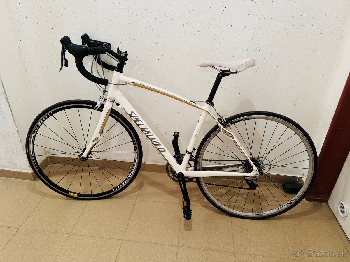 Zensky biely cestný bicykel Specialized Dolce