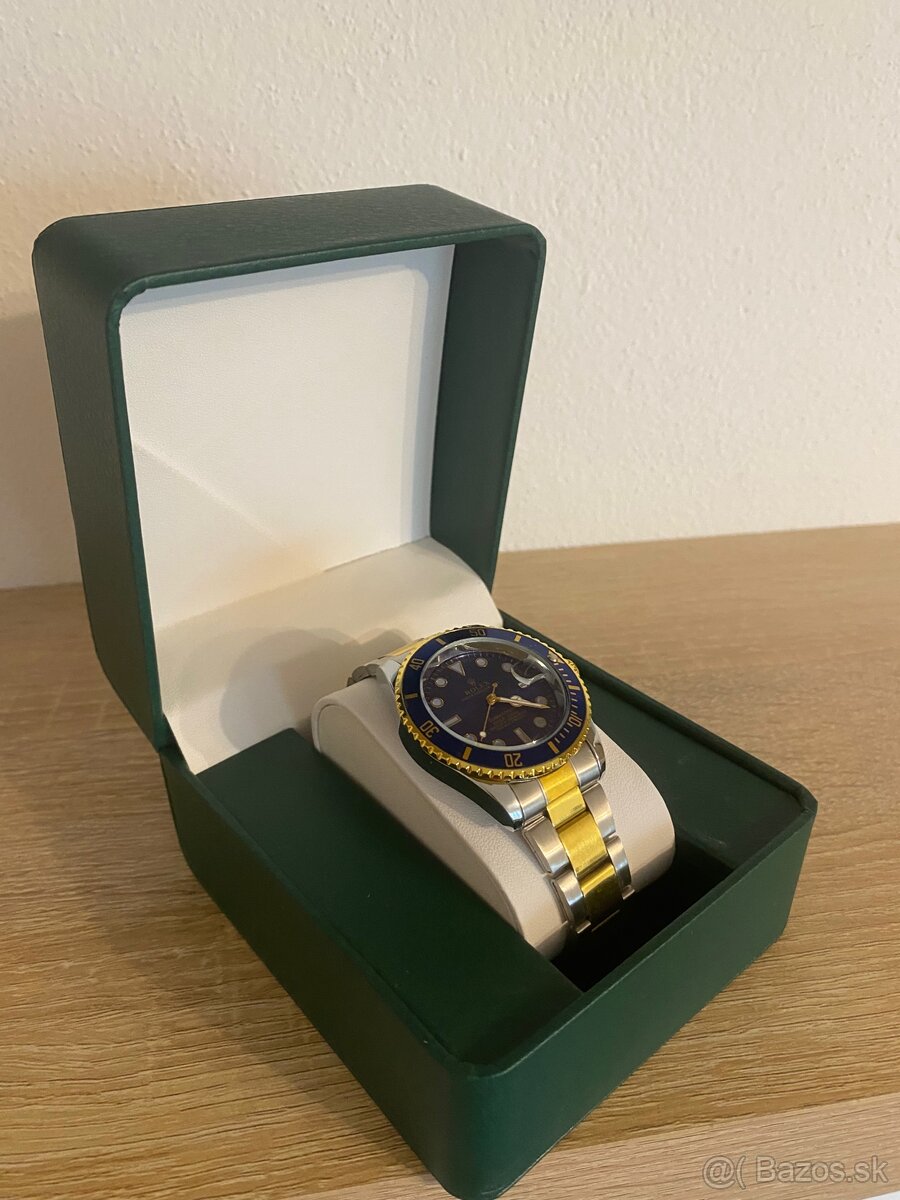 Rolex Submariner - Oystersteel, yellow gold