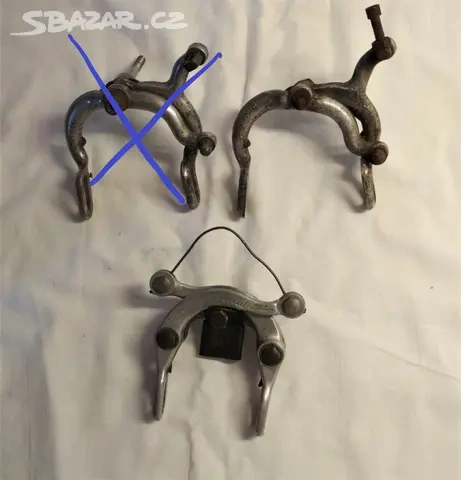 Staré díly ke kolu Favorit-dynama, čelisti, zvonek, aj.