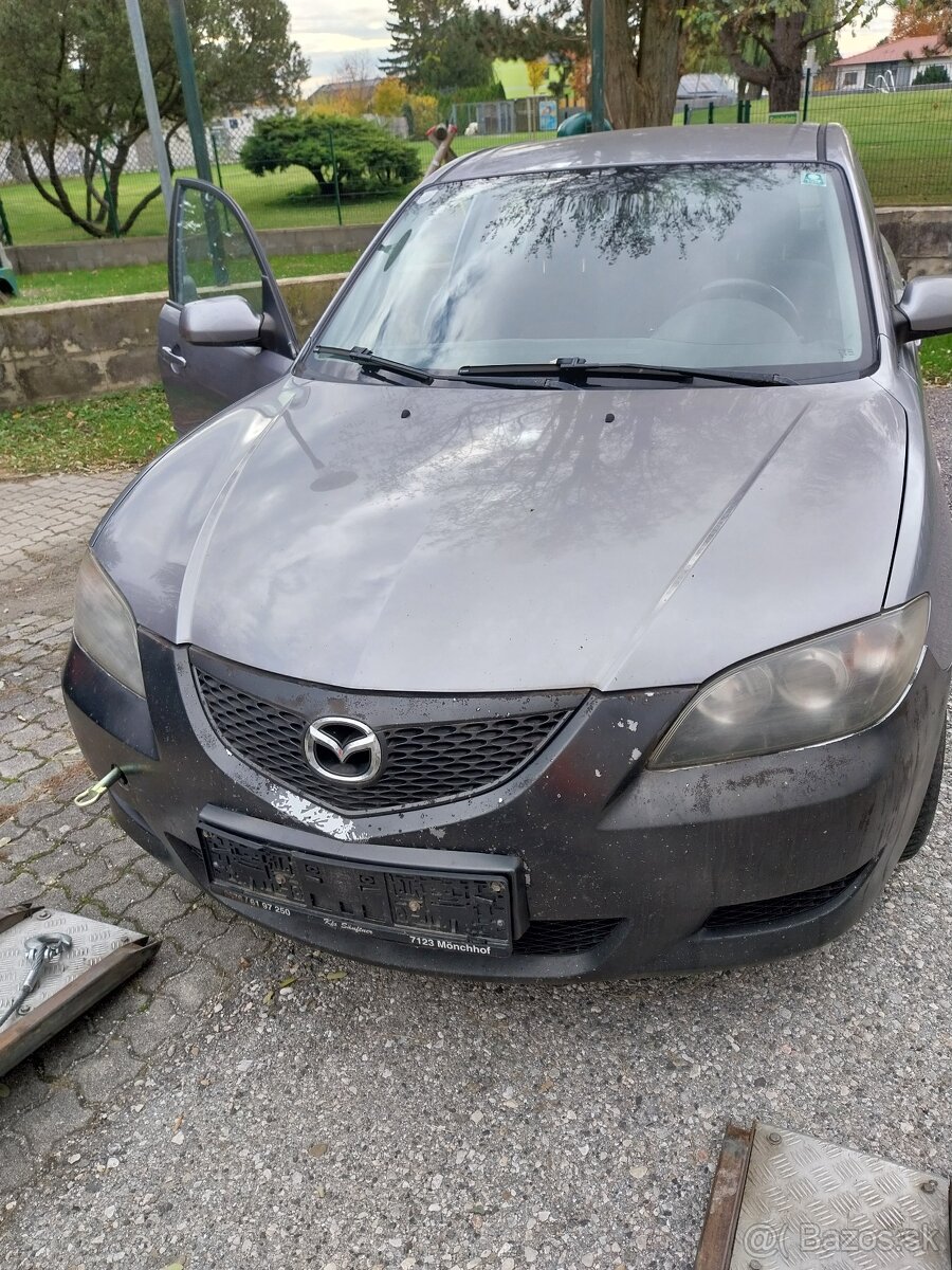 Mazda 3 1,6 77KW benzin r.v.2004